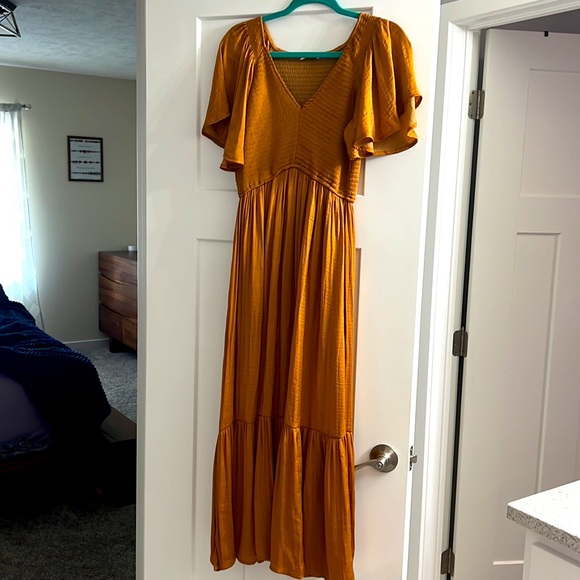 Copper/rust color with satin sheen. Elastic fit under bust. Only wore once - Picture 5 of 5